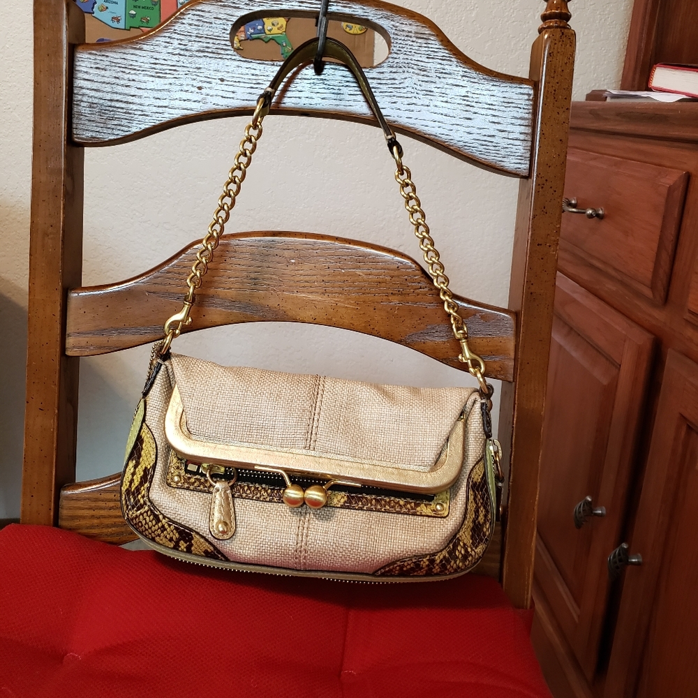 Coach kisslock purse.